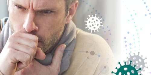 Ręka laboranta trzymająca probówki